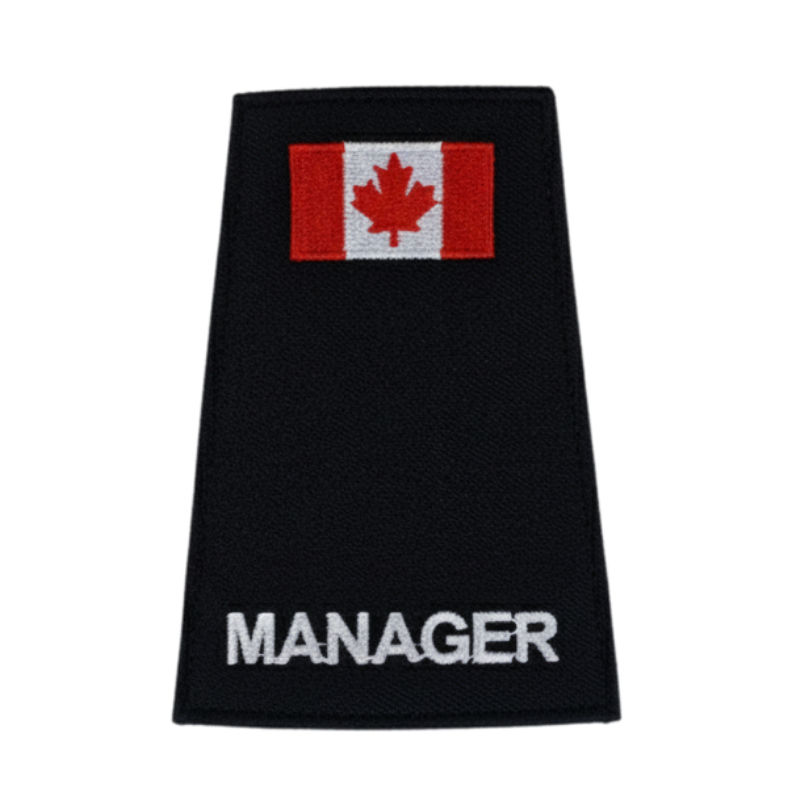 Black epaulette with Canadian flag and 'Manager' text on a white background