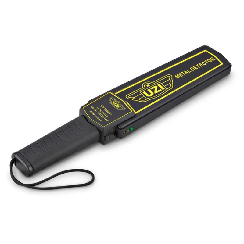 Black metal detector with yellow text on a white background